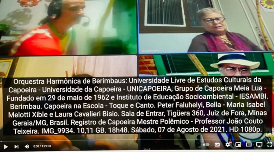 Orquestra Harmônica de Berimbaus: Universidade Livre de Estudos Culturais da Capoeira - Universidade da Capoeira - UNICAPOEIRA, Grupo de Capoeira Meia Lua - Fundado em 29 de maio de 1962 e Instituto de Educação Socioambiental - IESAMBI. Berimbau. Capoeira na Escola - Toque e Canto. Peter Faluhelyi, Bella - Maria Isabel Melotti Xible e Laura Cavalieri Bisio. Sala de Entrar, Tigüera 360, Juiz de Fora, Minas Gerais/MG, Brasil. Registro de Capoeira Mestre Polêmico - Professor João Couto Teixeira. IMG_9934. 10,11 GB. 18h48. Sábado, 07 de Agosto de 2021. HD 1080p.