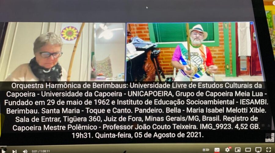 Orquestra Harmônica de Berimbaus: Universidade Livre de Estudos Culturais da Capoeira - Universidade da Capoeira - UNICAPOEIRA, Grupo de Capoeira Meia Lua - Fundado em 29 de maio de 1962 e Instituto de Educação Socioambiental - IESAMBI. Berimbau. Santa Maria - Toque e Canto. Pandeiro. Bella - Maria Isabel Melotti Xible. Sala de Entrar, Tigüera 360, Juiz de Fora, Minas Gerais/MG, Brasil. Registro de Capoeira Mestre Polêmico - Professor João Couto Teixeira. IMG_9923. 4,52 GB. 19h31. Quinta-feira, 05 de Agosto de 2021.