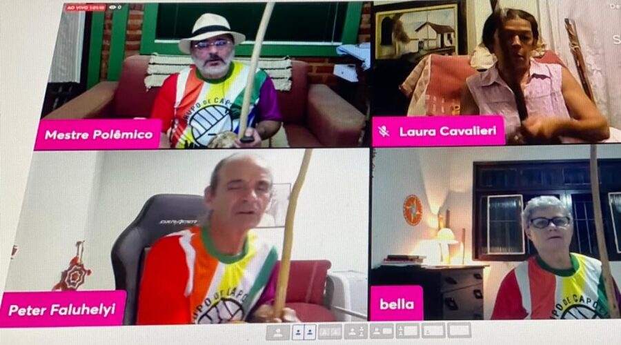 Orquestra Harmônica de Berimbaus: Universidade Livre de Estudos Culturais da Capoeira - Universidade da Capoeira - UNICAPOEIRA, Grupo de Capoeira Meia Lua - Fundado em 29 de maio de 1962 e Instituto de Educação Socioambiental - IESAMBI. Berimbaus - Iúnas Verdadeira e Mandingueira, Amazonas, Santa Maria e Baião. Toques e Cantos. Laura Cavalieri Bisio, Bella - Maria Izabel Melotti Xible e Peter Faluhelyi. Sala de Entrar, Tigüera 360, Juiz de Fora, Minas Gerais/MG, Brasil. Registro de Capoeira Mestre Polêmico - Professor João Couto Teixeira. IMG_2667. 4,86 GB. 19h03. Sábado, 04 de Dezembro de 2021.